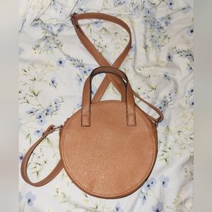 Brown circle crossbody purse